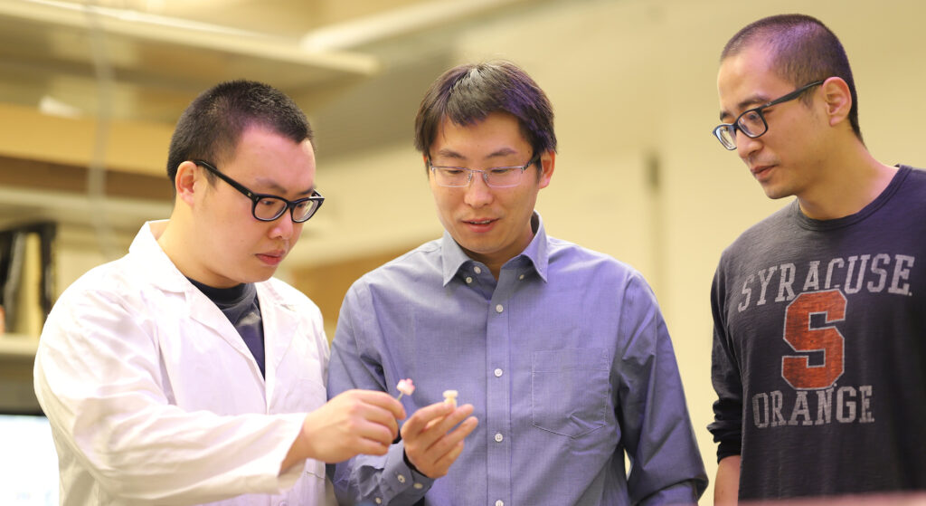 Professor Wanliang Shan (center) and research team members Dr. Guangchao Wan (left) and Ph.D. student Chenxu Zhao (right)