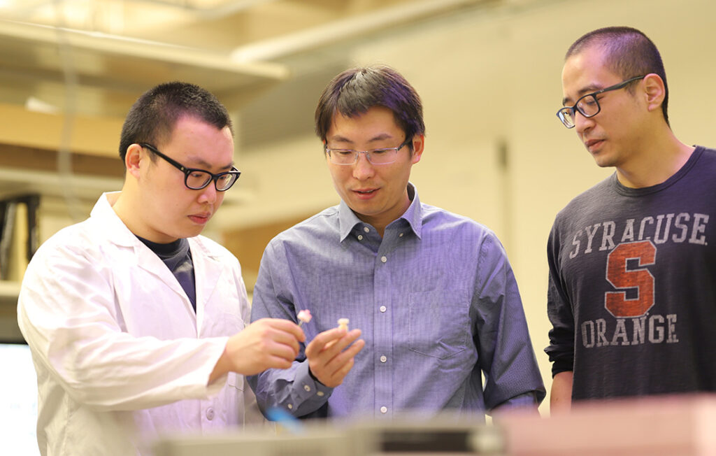 Mechanical and Aerospace Engineering Professor Wanliang Shan and graduate student researchers