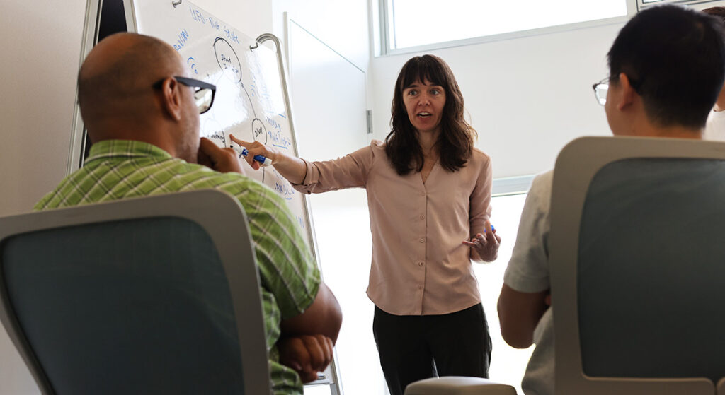 Professor Liz Carter working with students