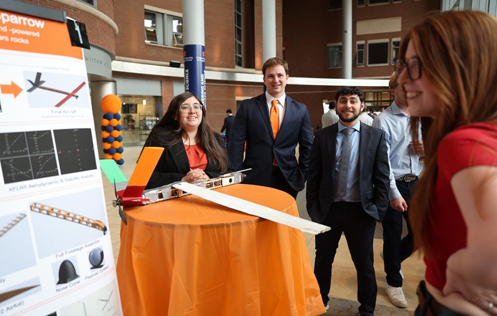 Students presenting their capstone design projects to faculty and fellow students