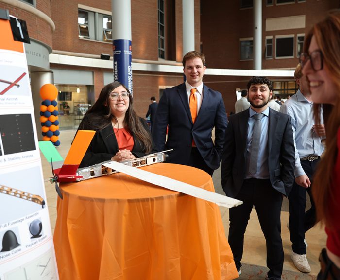 Students presenting their capstone design projects to faculty and fellow students