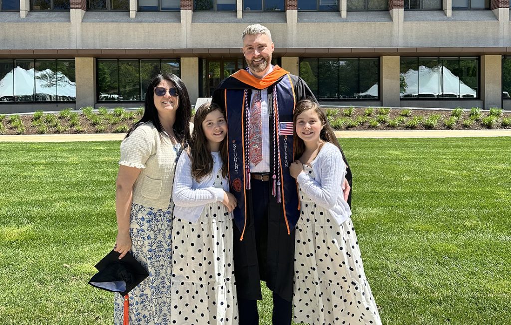 John Steele and his family in front of Link Hall
