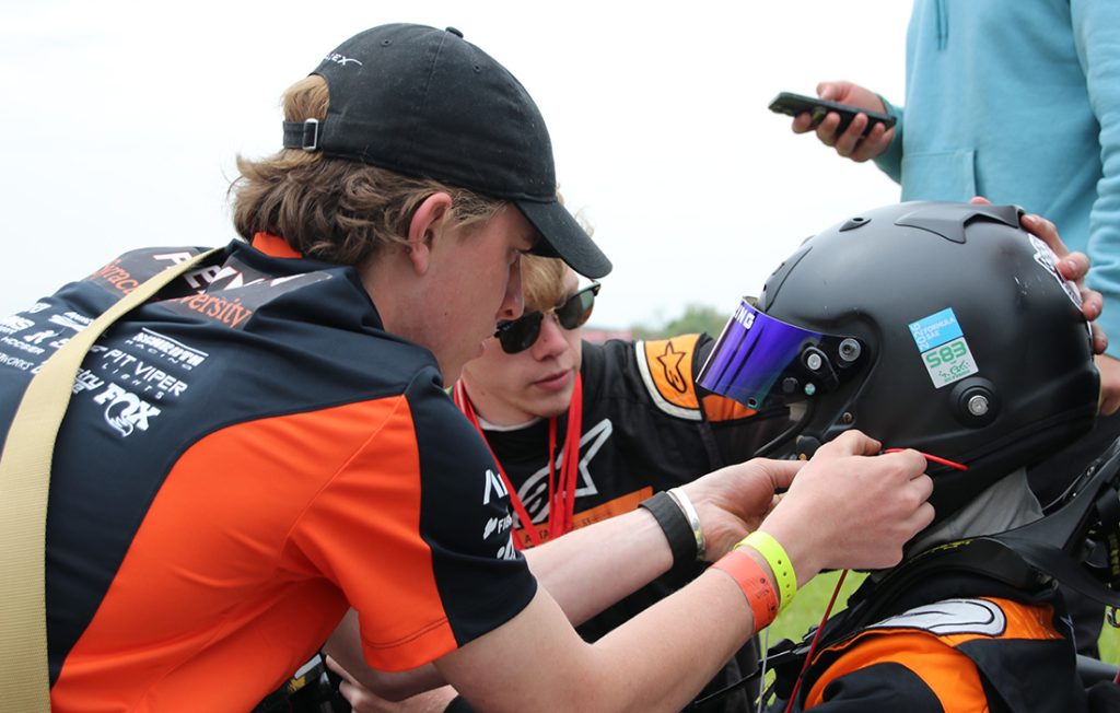 Citrus Racing team members preparing for an event