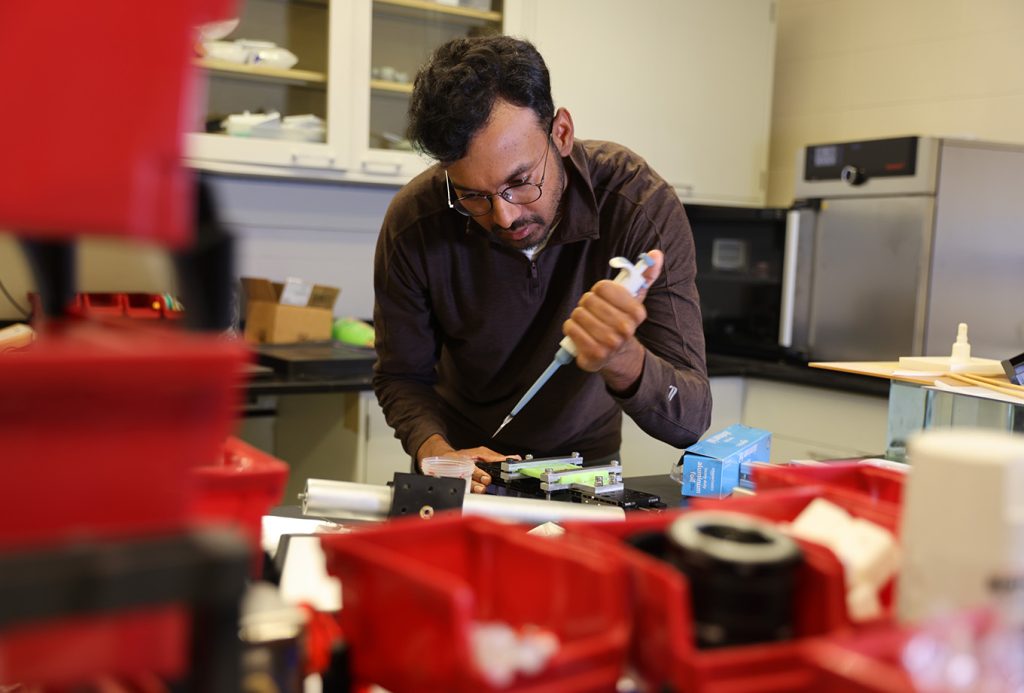 Professor Anupam Pandey working in his laboratory